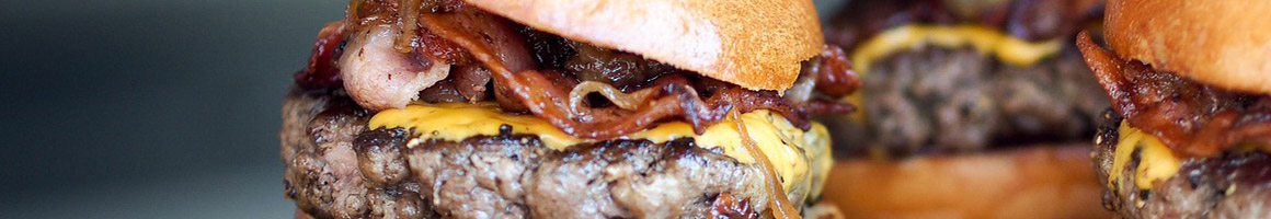 Eating American (Traditional) Burger Hot Dog at The Burger Shack restaurant in Jupiter, FL.